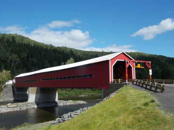 Covered bridge over river between New Brunswick and Quebec.